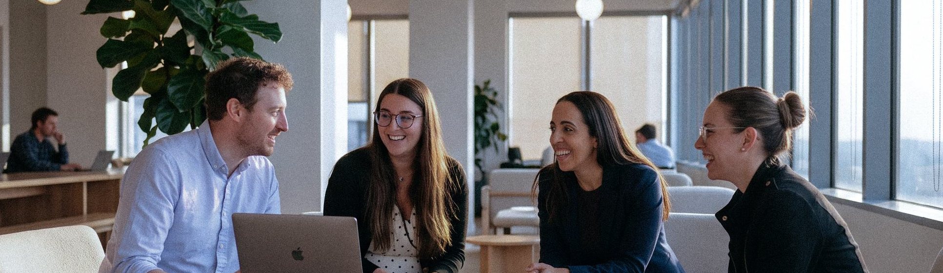 DNAnexus team members talking in the office